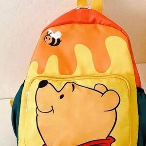 Winnie the Pooh 12inch Kid's
Deluxe Oversize Print Day backpack.